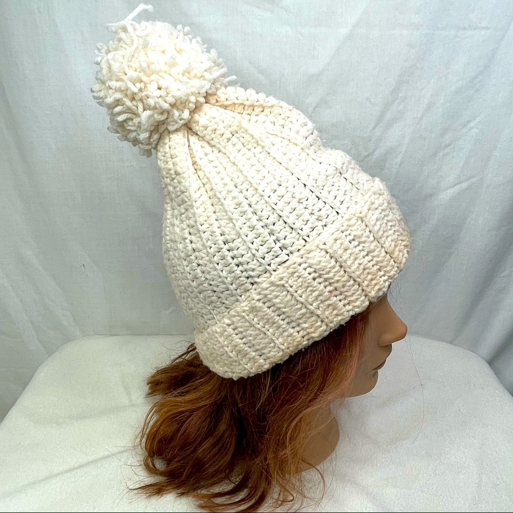 Knit pompom beanie in off white color